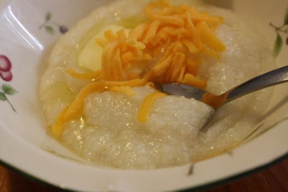 Overnight slow cooker grits are a bowl full of comfort on a cool morning. A delicious highlight for brunch. Simple and easy to tuck in the slow cooker.